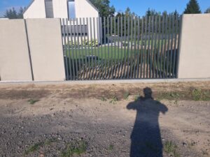 a shadow of a person on the ground